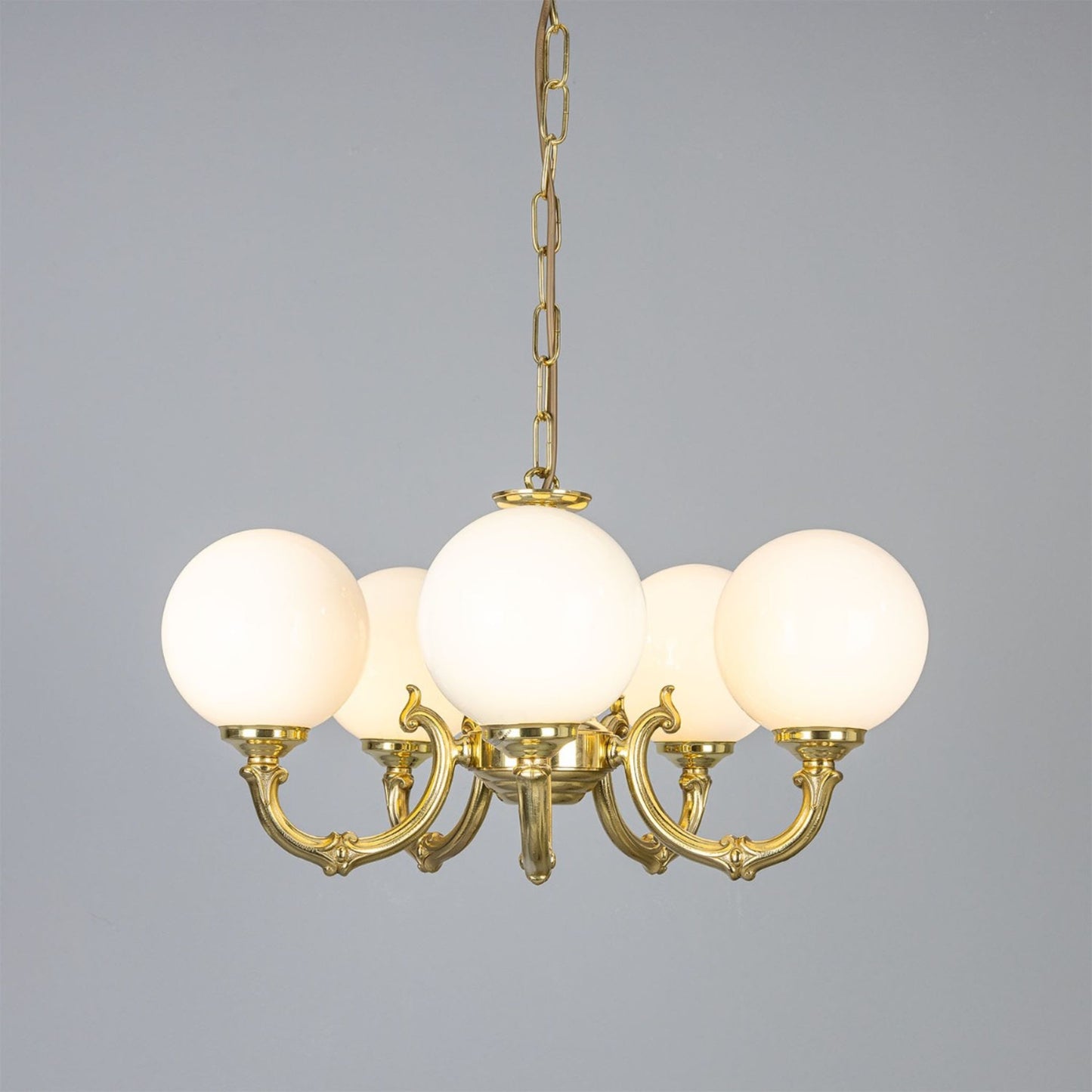 Ben 5-Arm Ornate Brass Chandelier with Opal Globes Glass